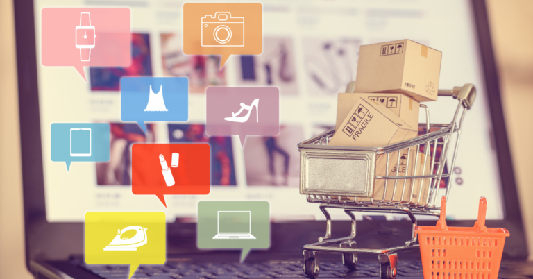 A shopping cart appears in front of a laptop showing an online store, along with graphics representing eCommerce. Learn how to get mockups to launch your store using our free apparel mockup generator at MockIt
