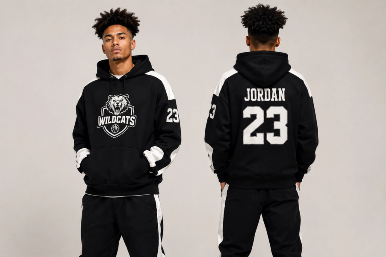 Two men pose in black and white hoodies: one faces front with a Wildcats logo on the chest and the number 23 on the sleeve; the other shows the back with 'JORDAN' and '23'.