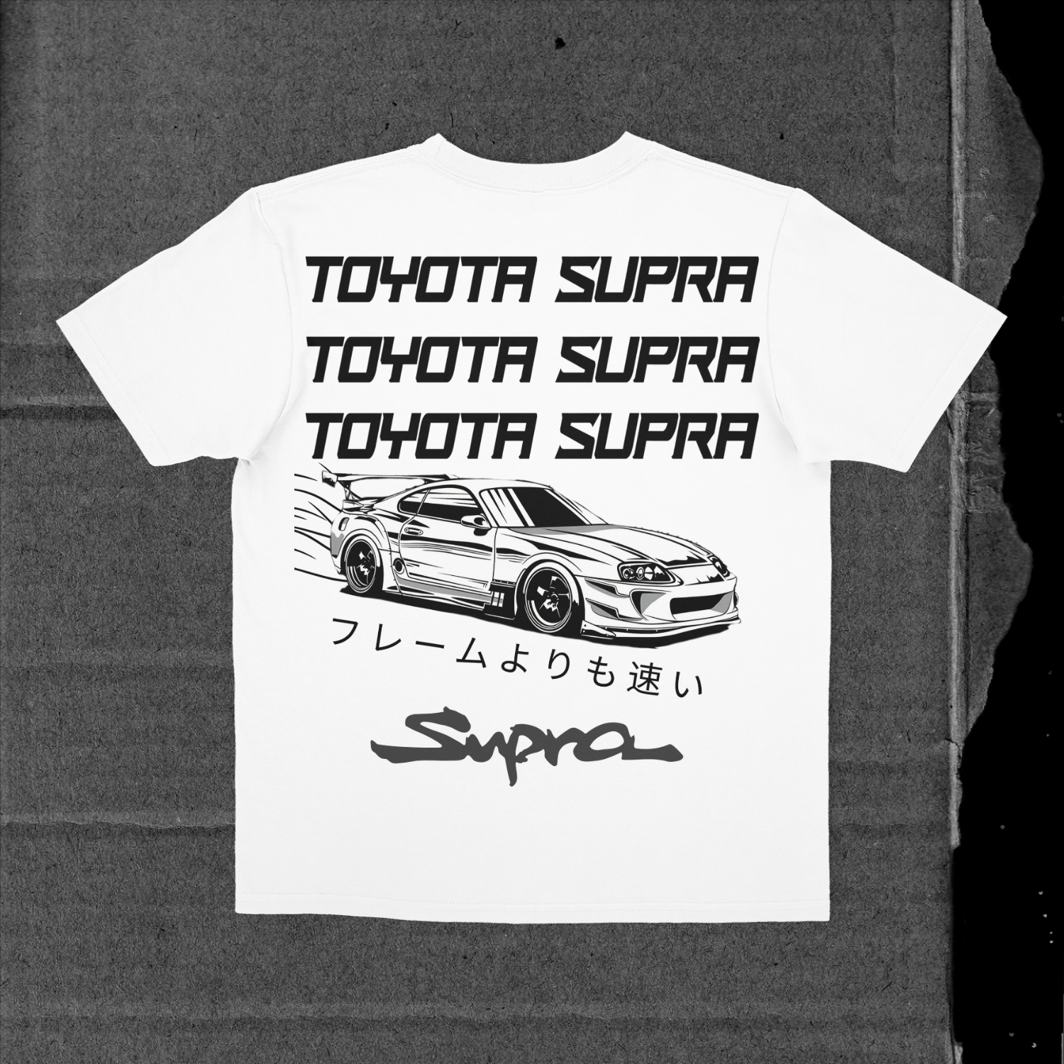 White t-shirt with toyota supra text and sports car graphic.